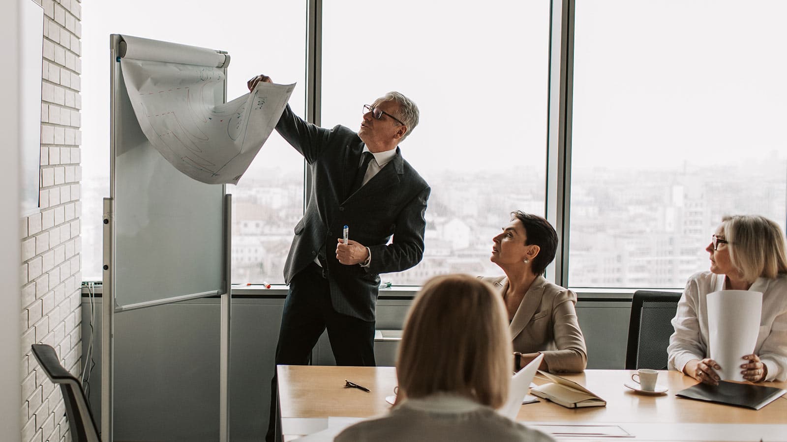 Man presenting with flip chart