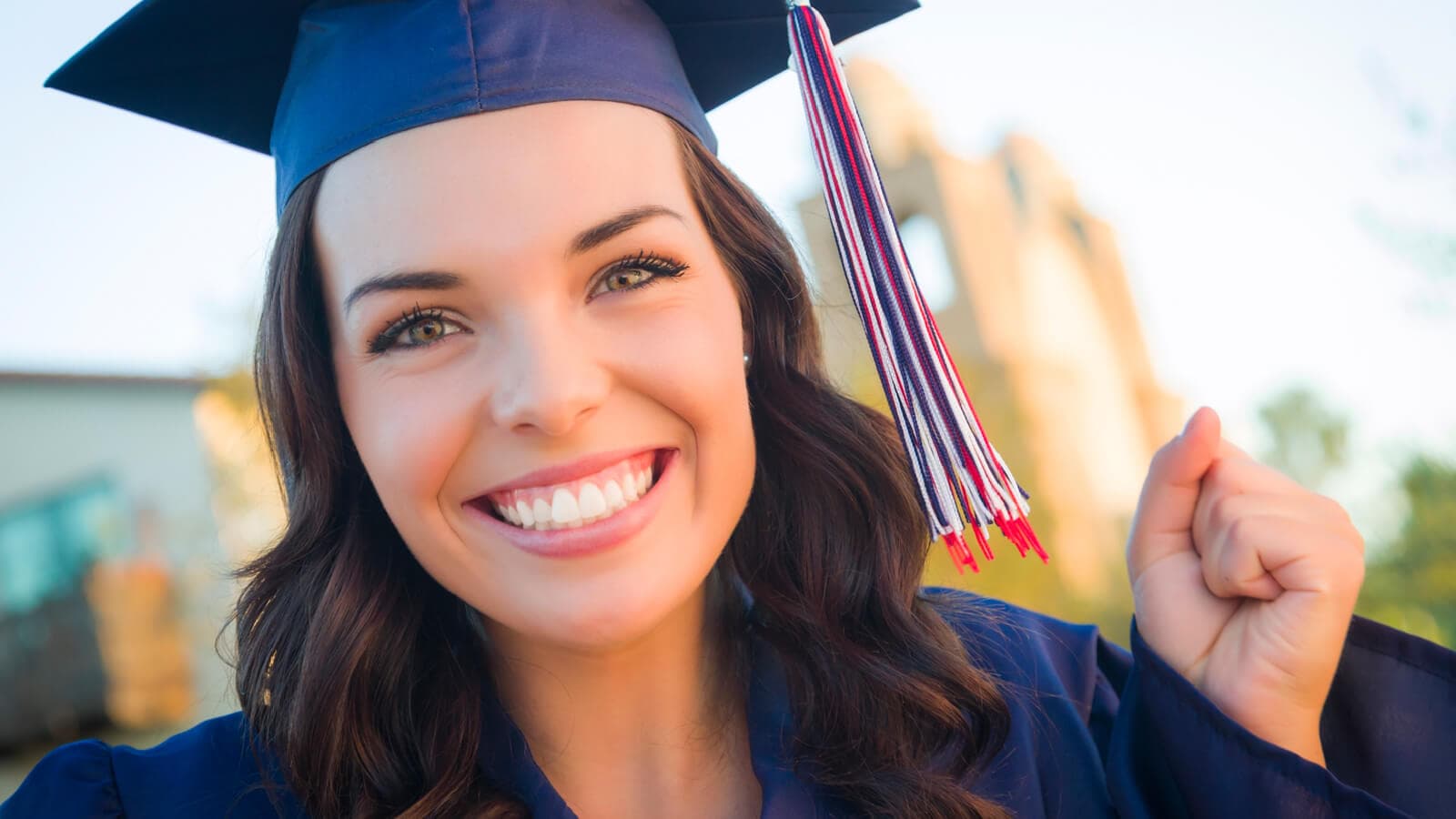 Graduate in cap and gown