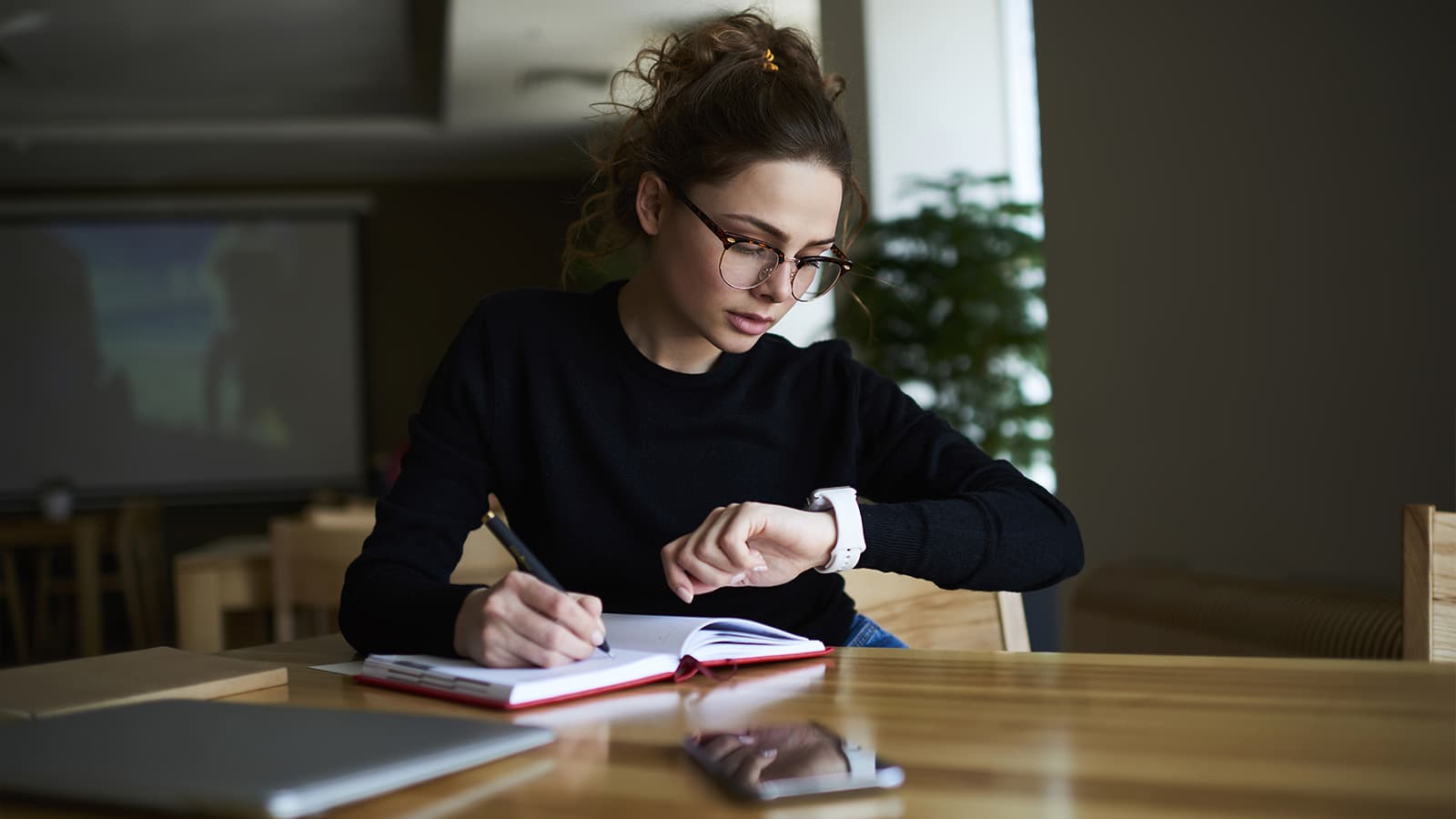 Woman looking at watch