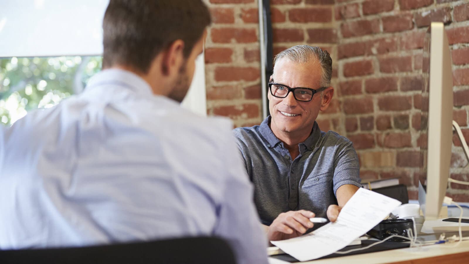 Man interviewing another man