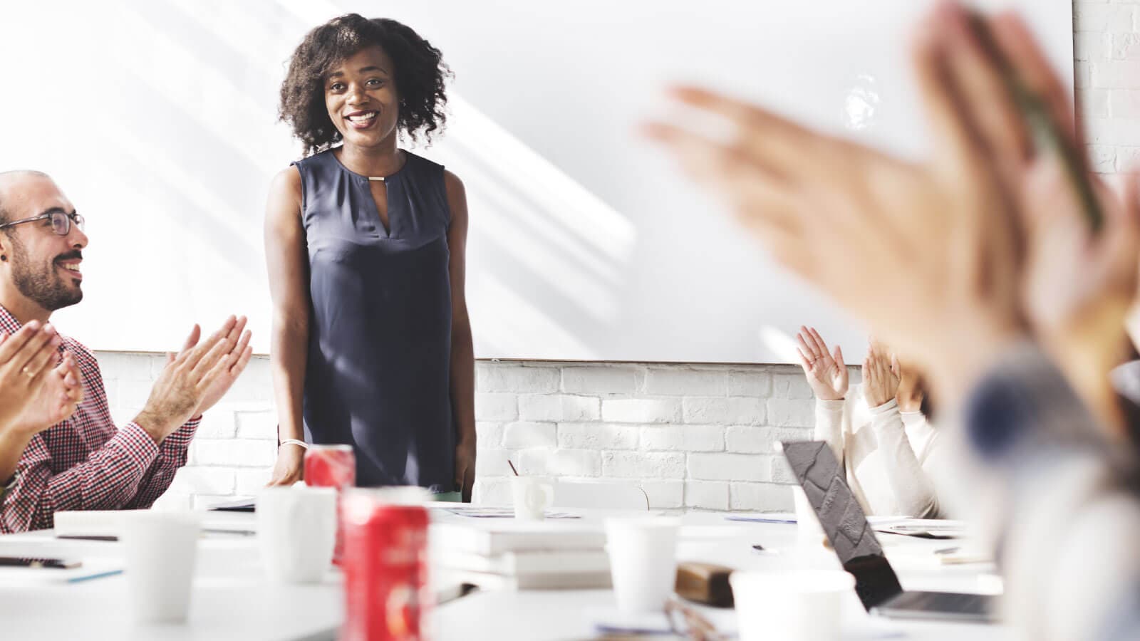 Woman being applauded