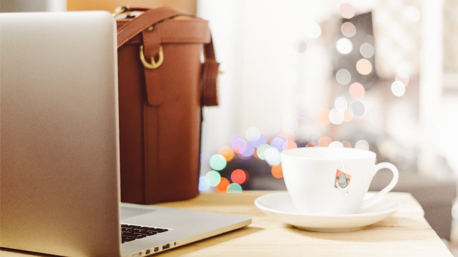 Laptop and coffee cup