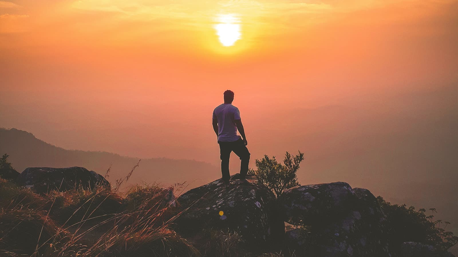 Man looking at sunset
