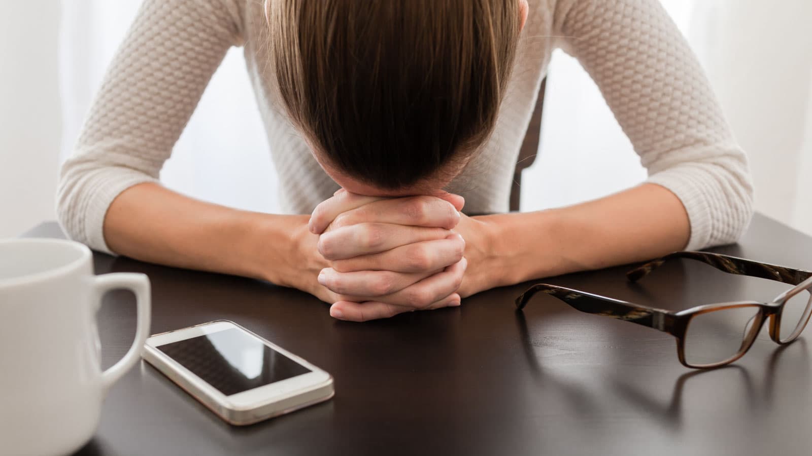Head down on desk
