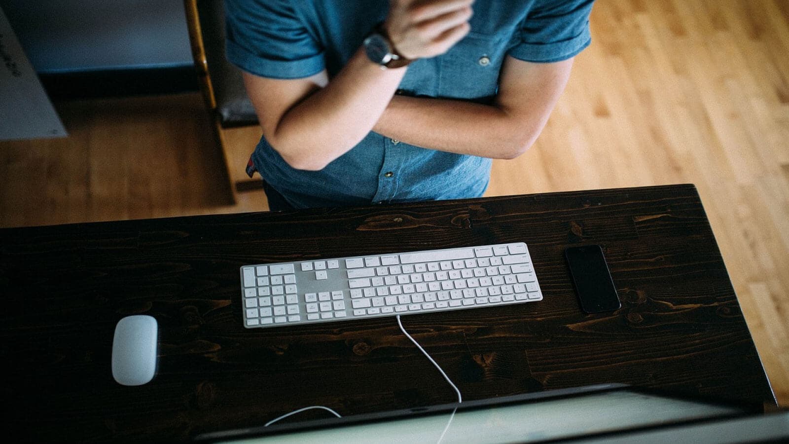 Man thinking at computer