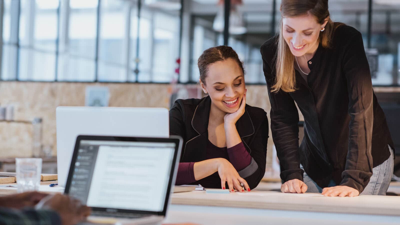 Two women at work